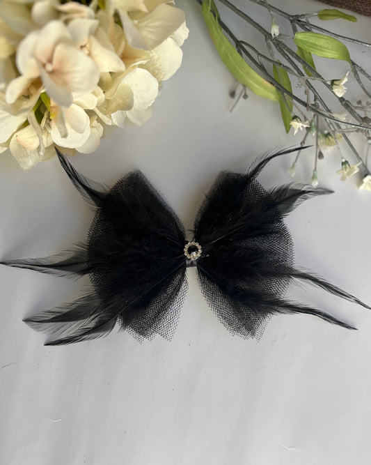 Black sparkle tulle with feathers and center charm clip in hair bow