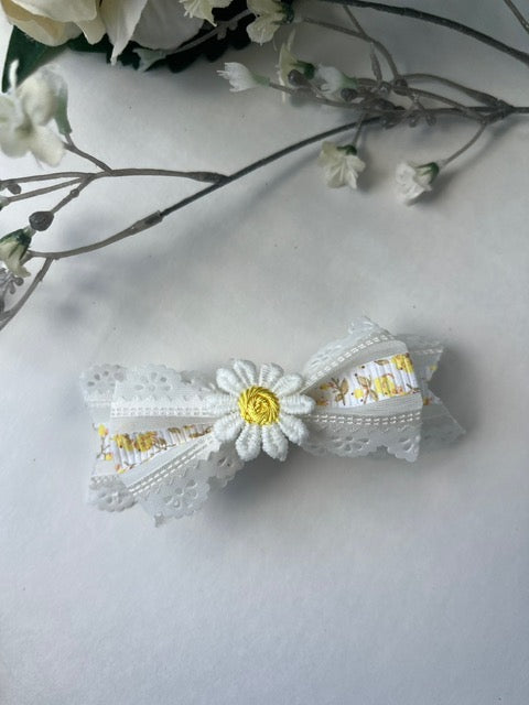 Ivory organza laser cut yellow flower print clip in hair bow