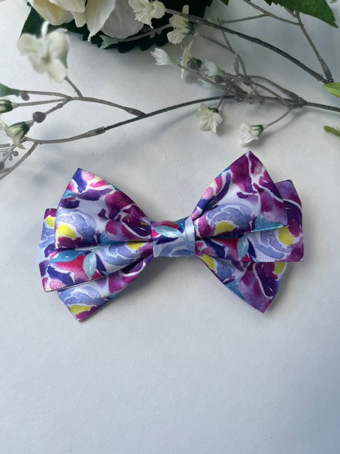 Purple multi print satin elegant clip in hair bow