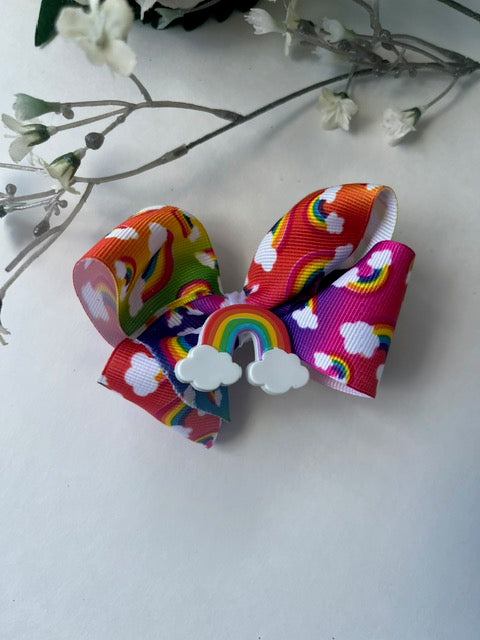 Rainbow print twisted boutique clip in hair bow